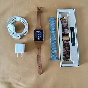 Apple Smartwatch with Brown and Blue Bands